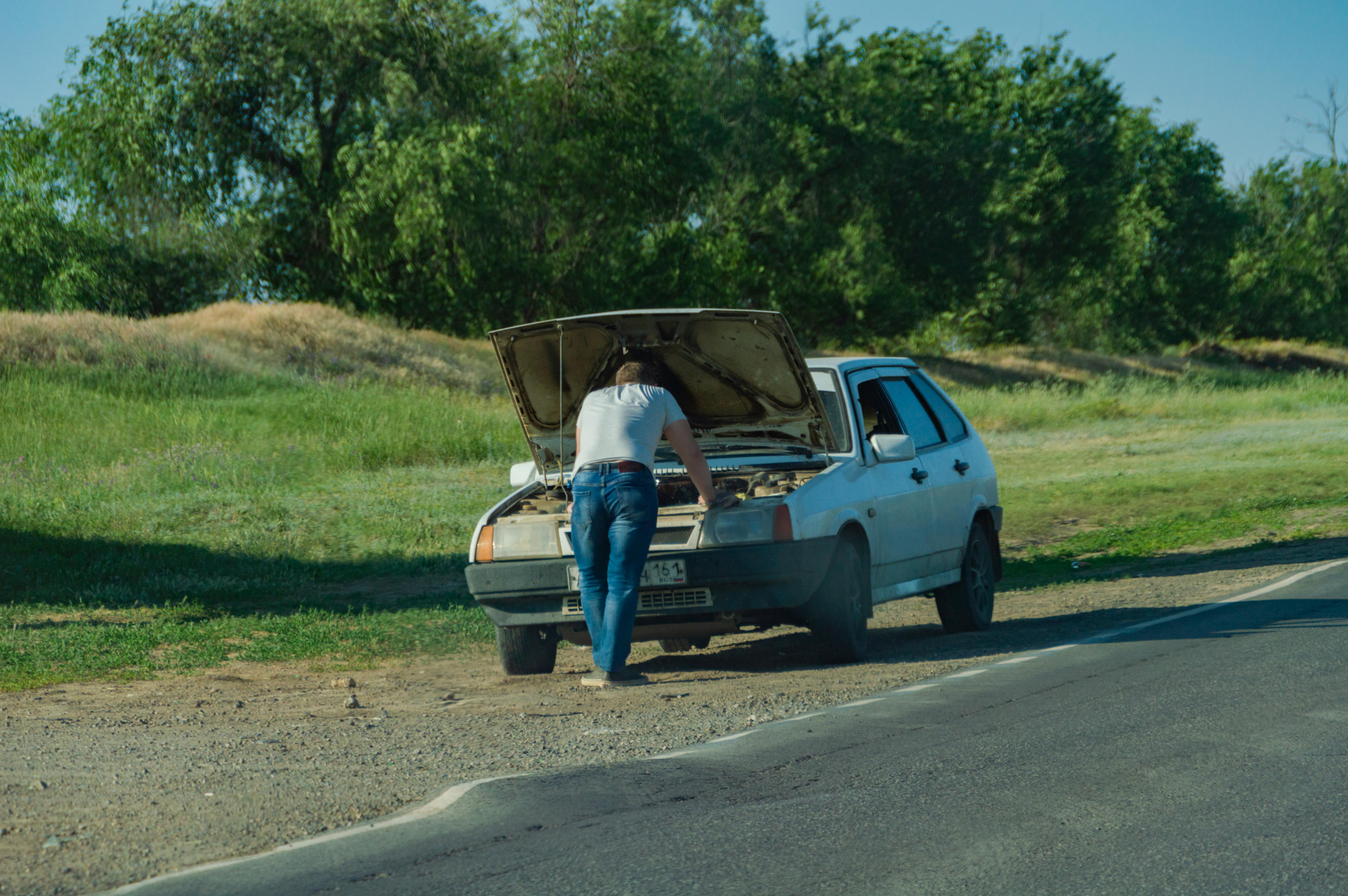 Old car broken down side of the road