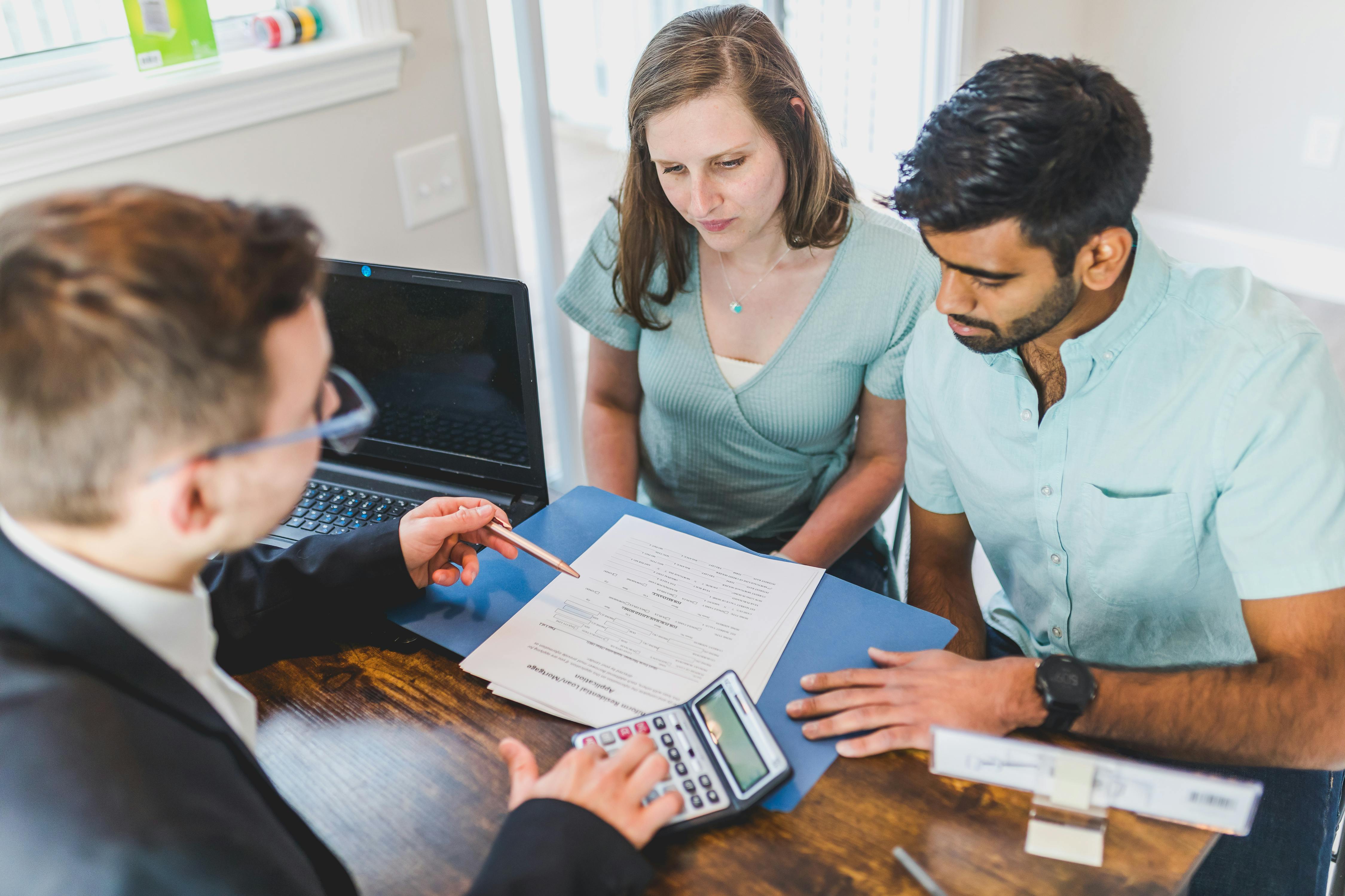 Couple and mortgage advisor